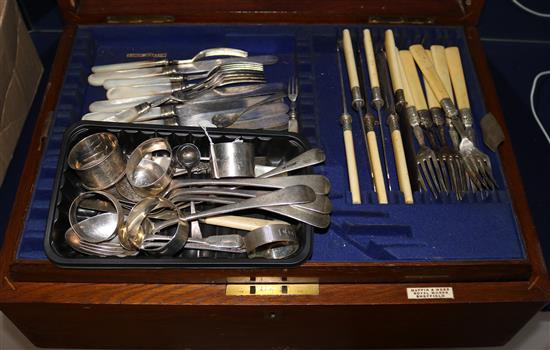 A canteen containing assorted silver plated cutlery, together with 20 assorted silver items.
